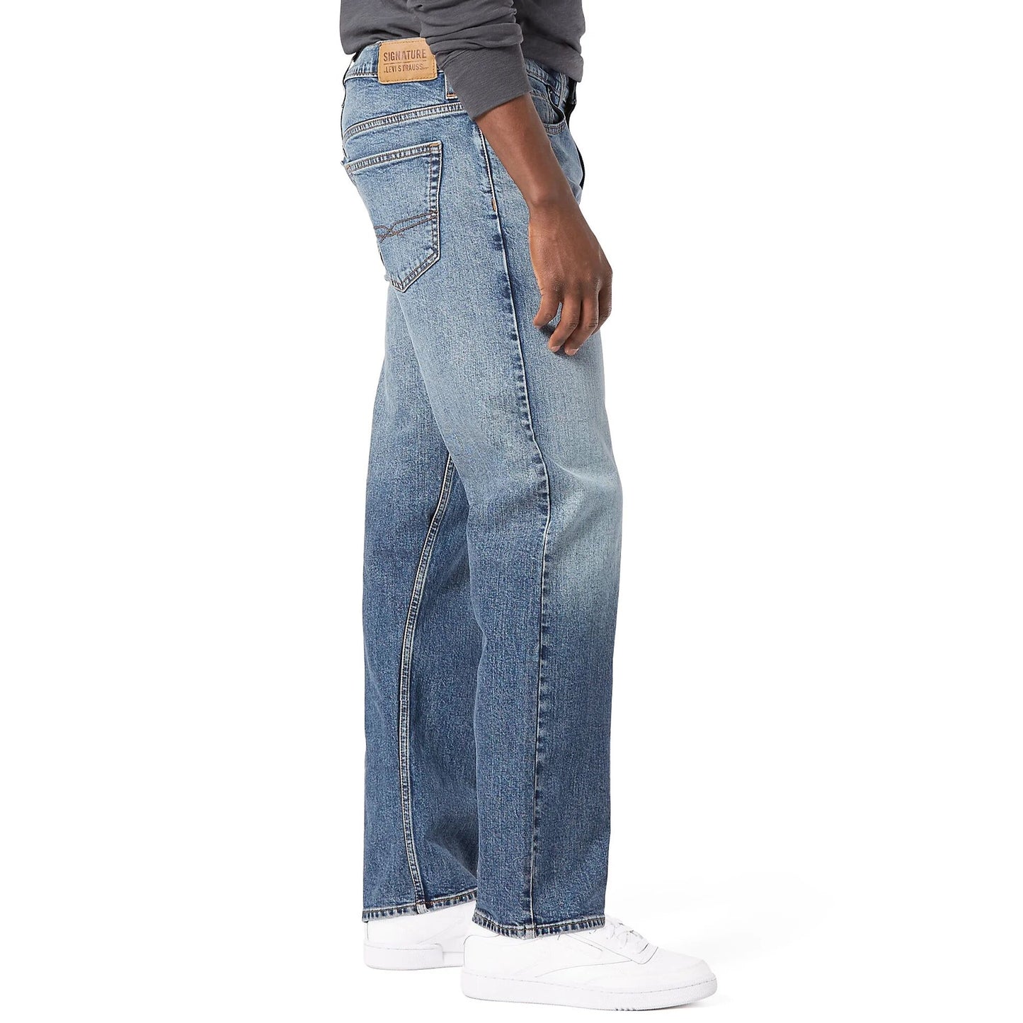 Full-length flat lay of Flying Strauss Signature Loose Fit Jeans in light wash