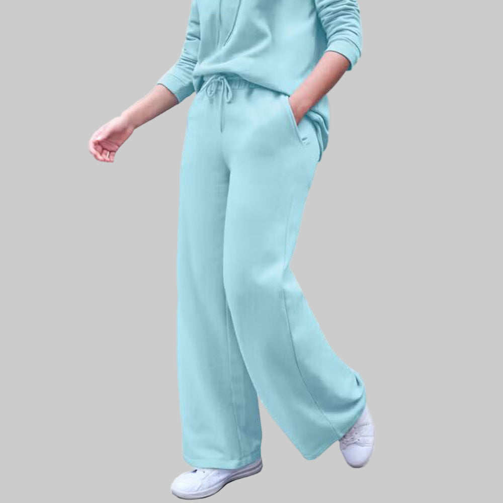 Plus-size Aqua Sky wide leg fleece sweatpants with drawstring waist and side pockets, displayed flat on a white background.