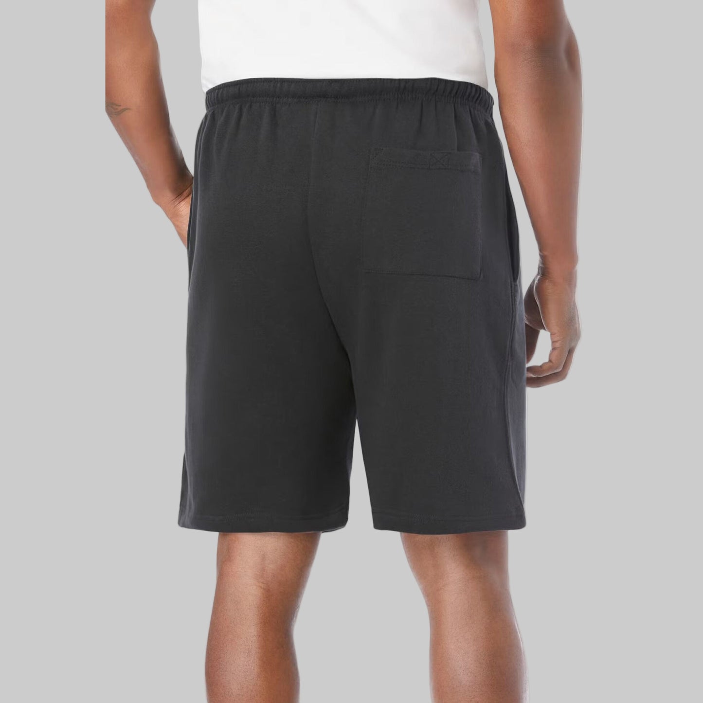 Black fleece big size shorts with drawstring waist and pockets displayed on a clean studio background.