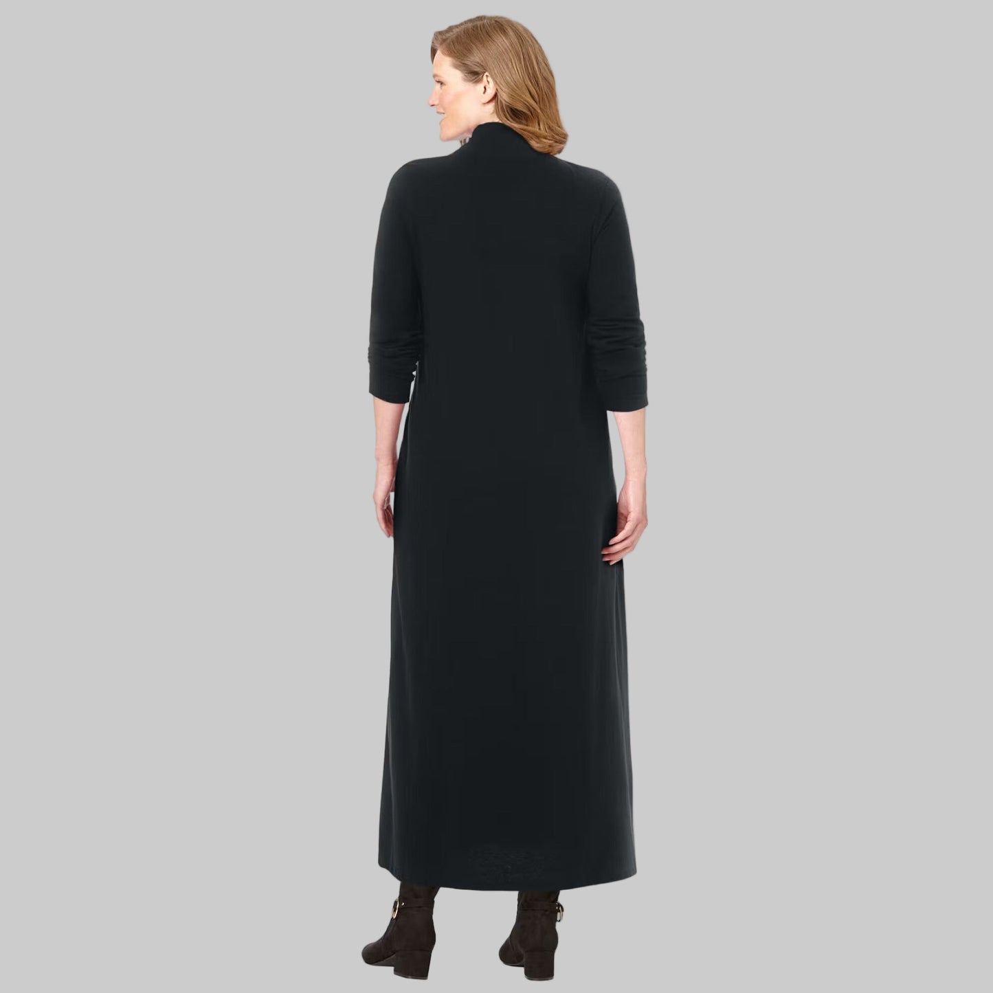 Plus-size model wearing Black Mockneck Dress with long sleeves