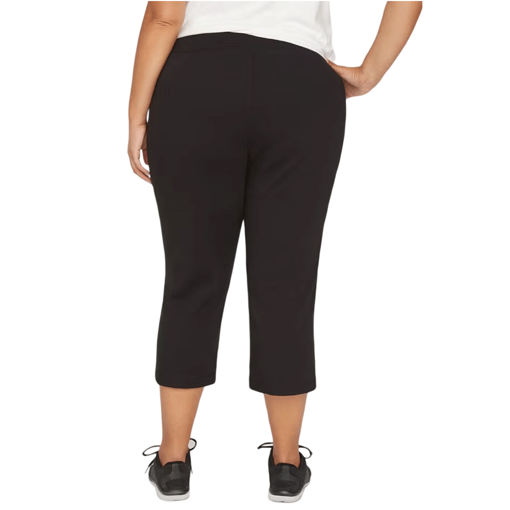 A Black Plus Size Women Yoga Capri featuring a wide elastic waistband, soft stretch fabric, and a moisture-wicking design for workouts or casual wear.
