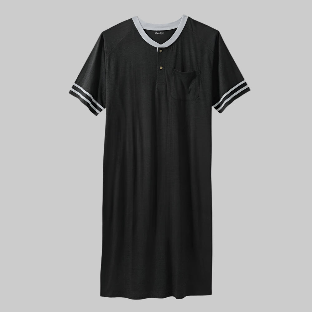 Black short-sleeve henley nightshirt laid flat on a white surface, showing button placket and relaxed silhouette.