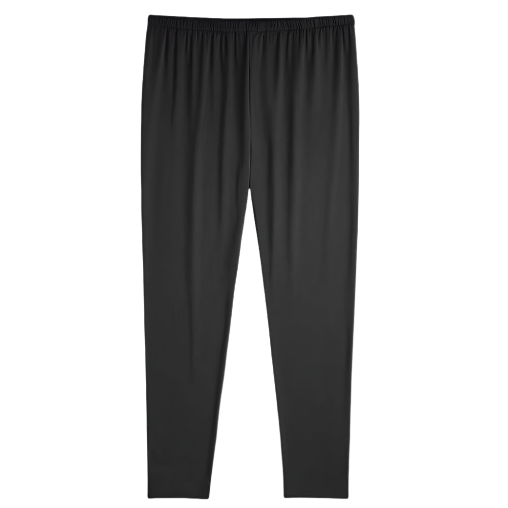 Plus size woman wearing high-rise black performance activewear leggings in studio