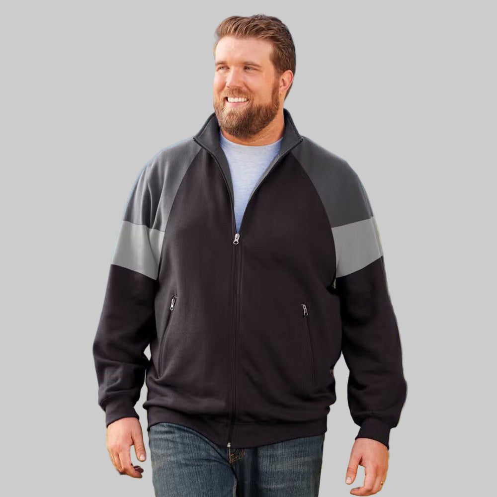 Black wicking color block full zip track jacket with ribbed cuffs, hem, and front zip pockets, made from soft moisture-wicking cotton-poly fabric.