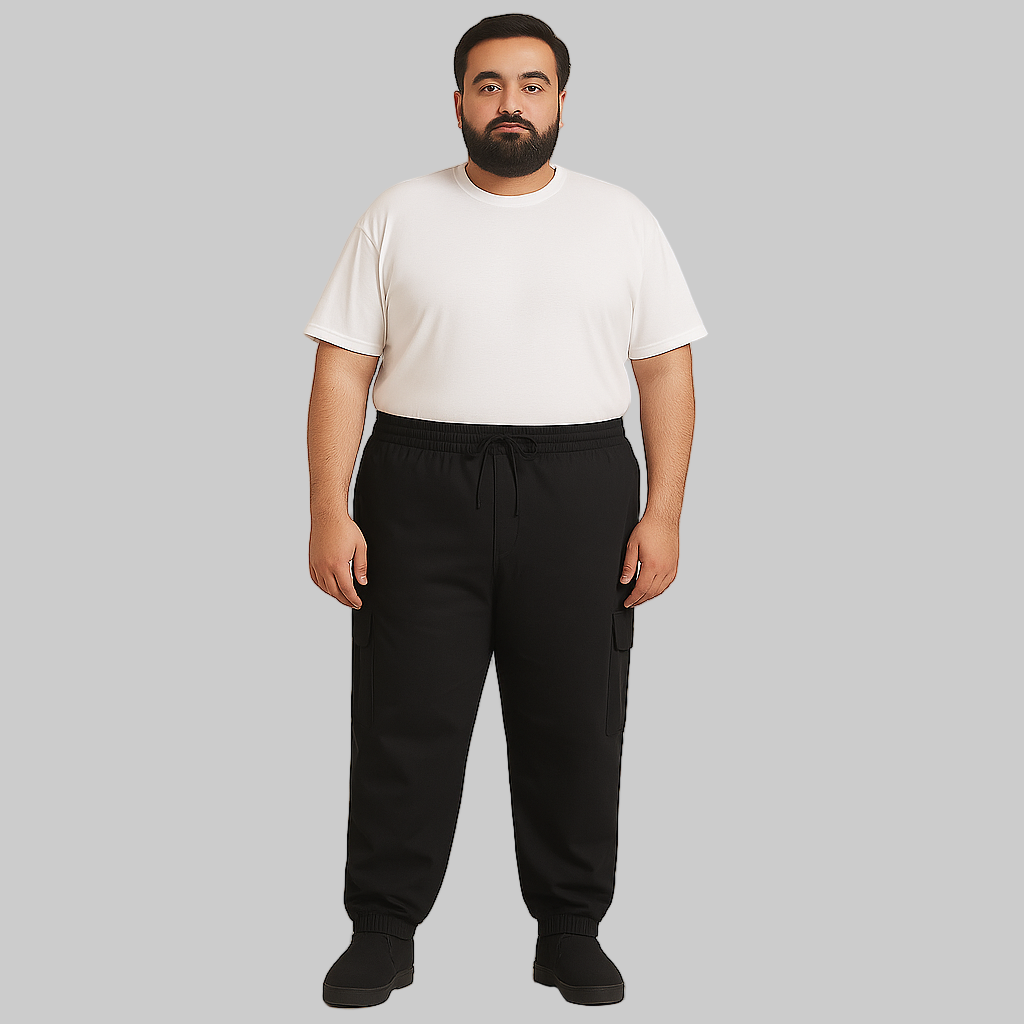 Plus-size male model wearing black twill cotton cargo joggers with side and back pockets