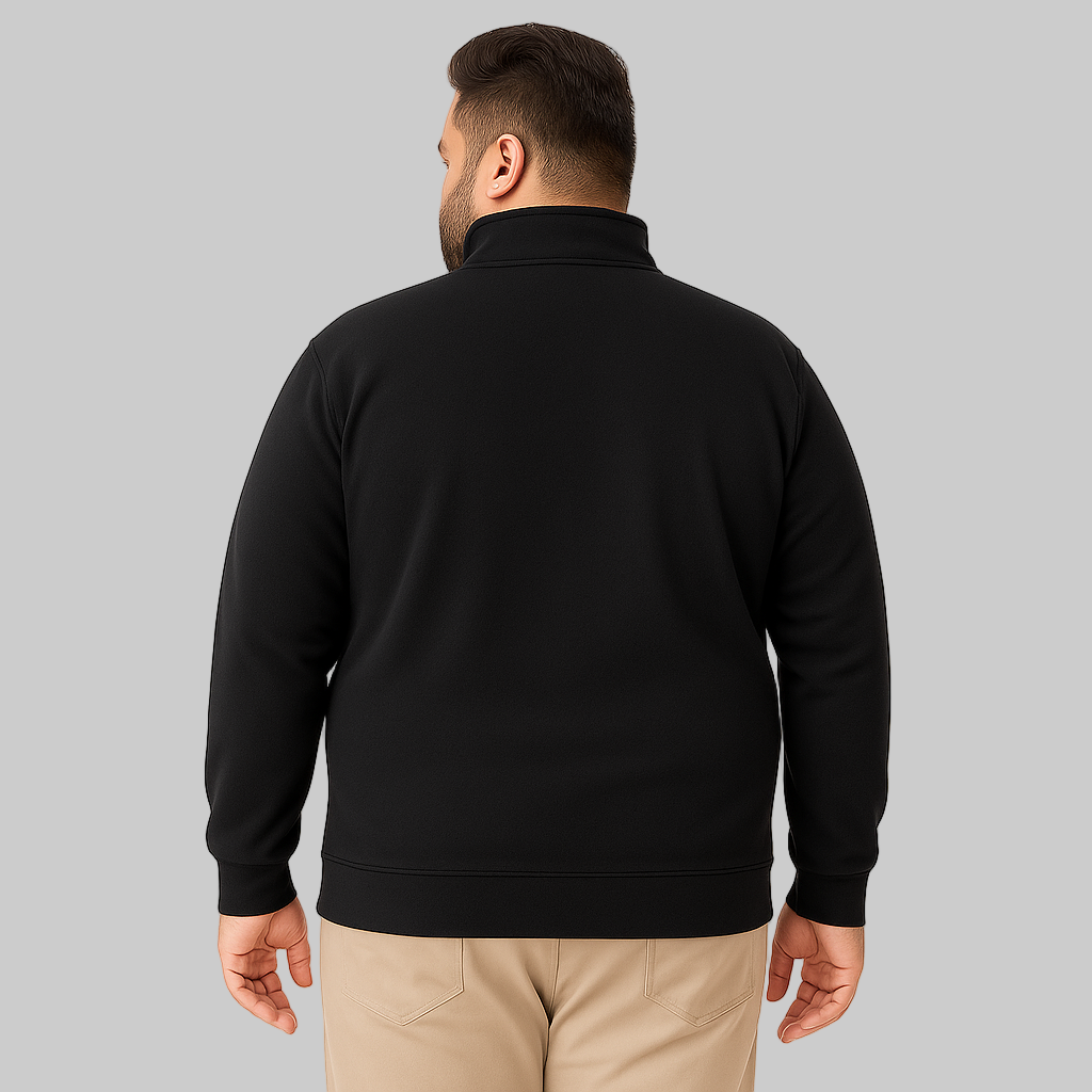 Plus-size male model wearing black quarter-zip fleece sweatshirt with kangaroo pocket, front view on white background.