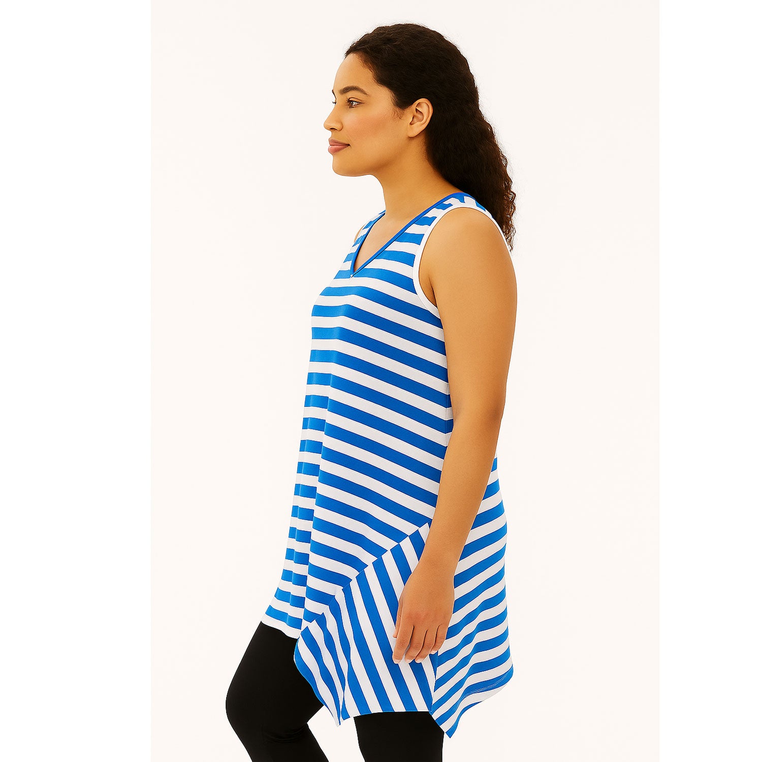 Woman wearing blue and white sleeveless cotton tunic with hanky hem and V-neck