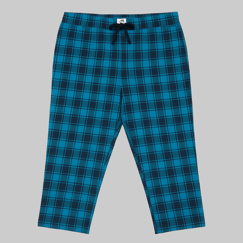 Blue plaid plus-size jersey lycra trousers with drawstring waistband, laid flat on white background