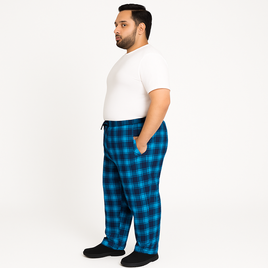 Blue plaid plus-size jersey lycra trousers with drawstring waistband, laid flat on white background