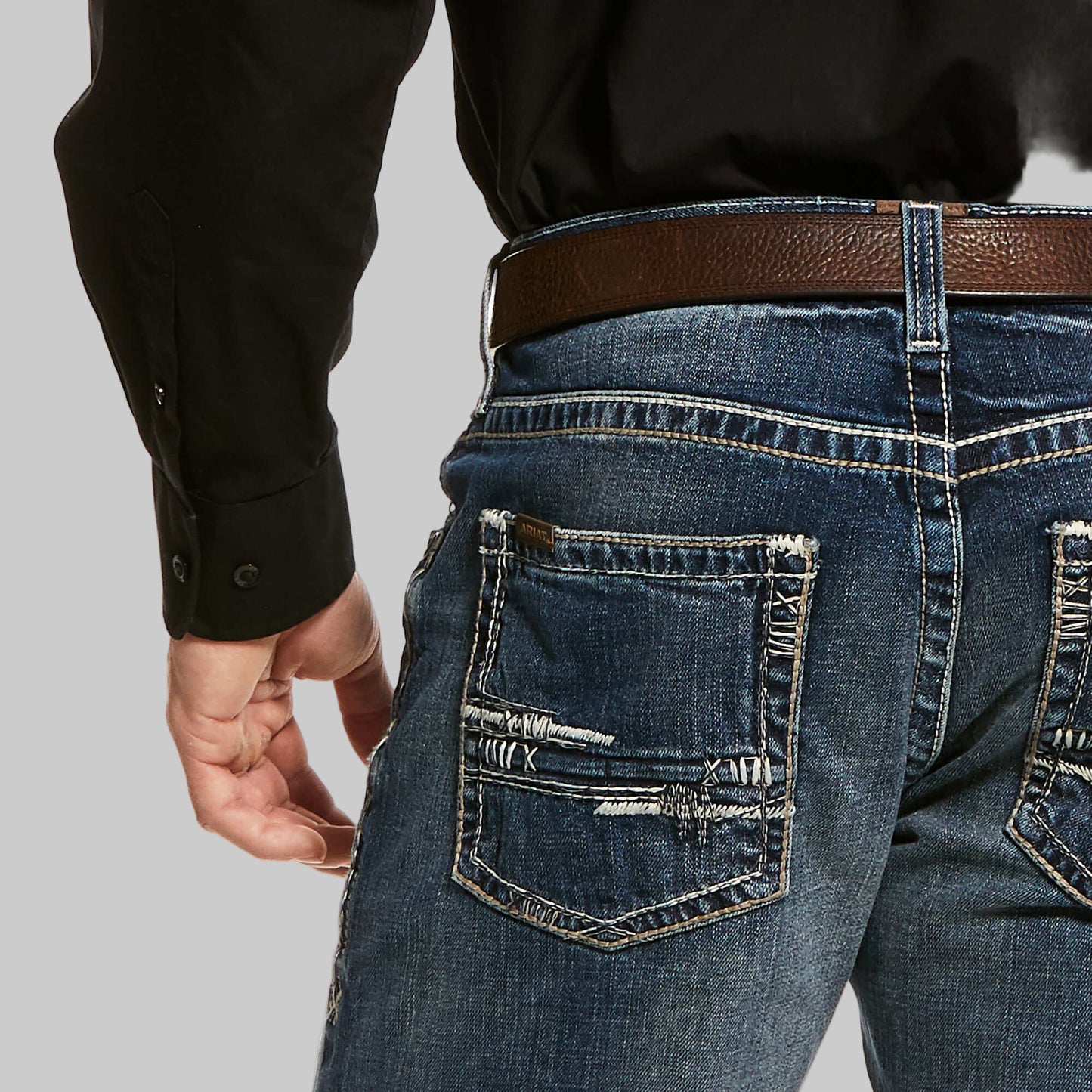 Plus-size male model wearing Blue Wash Stackable Straight Jeans, straight-leg M5 fit, deep blue wash, comfortable stretch denim, front studio view.