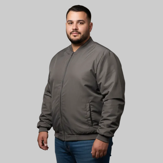 Brown plus size bomber jacket with front zip closure and ribbed cuffs on a clean background.