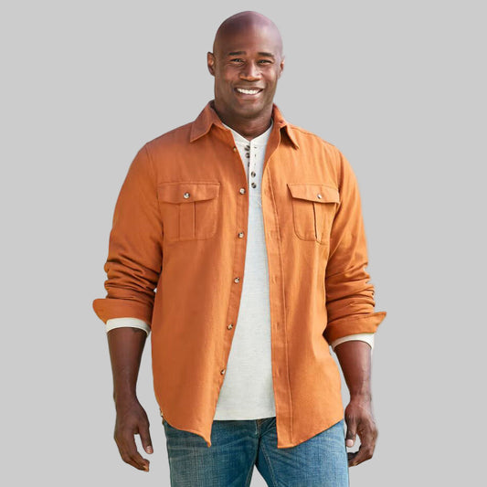 Men’s Burnt Orange Signature Solid Flannel Shirt with horn buttons, adjustable cuffs, and button-flap chest pockets in double-brushed 100% cotton.