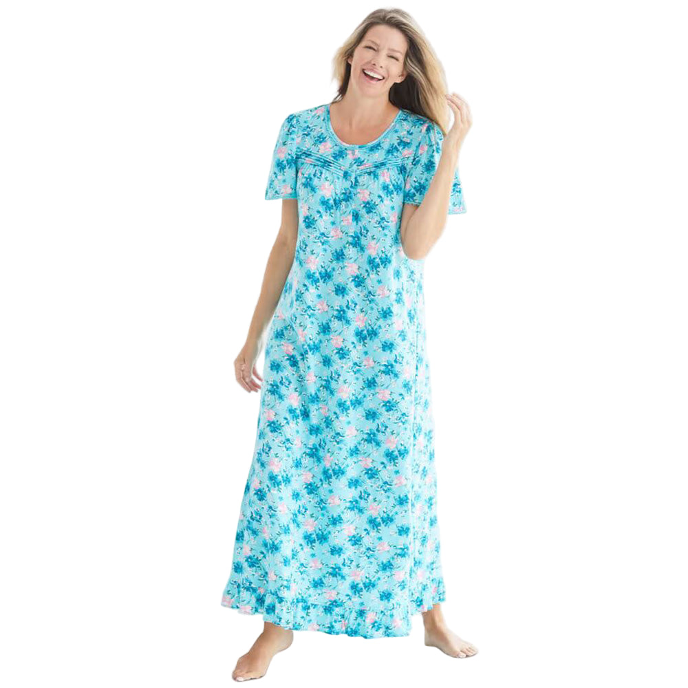 Women’s plus size long cotton gown in Caribbean blue floral print with flutter sleeves, ruffled hem, and front pintuck detail.