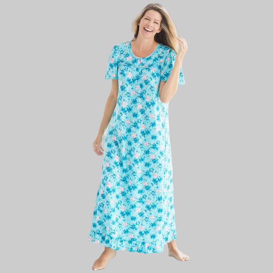 Women’s plus size long cotton gown in Caribbean blue floral print with flutter sleeves, ruffled hem, and front pintuck detail.