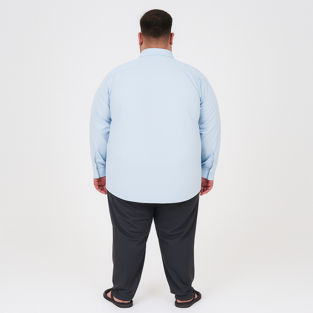Plus-size Pakistani man wearing sky blue solid full-sleeve formal shirt