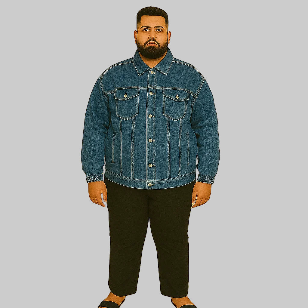 Plus-size man wearing classic blue denim jacket with elastic cuffs and chest flap pockets