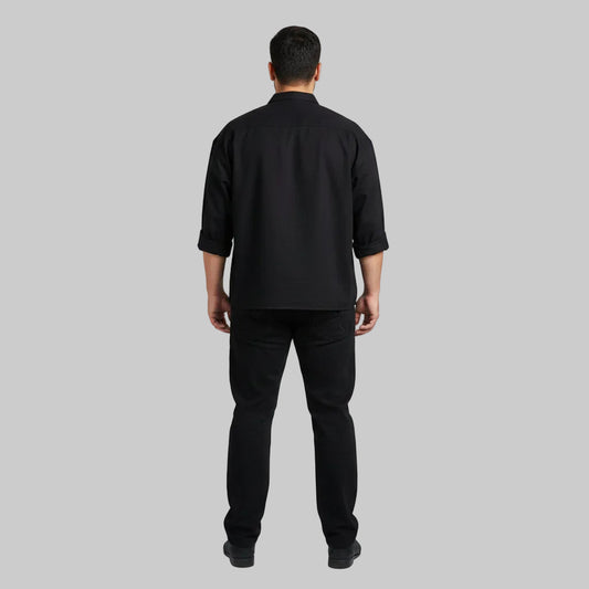 Classic jet black straight fit cotton denim jeans with button closure.