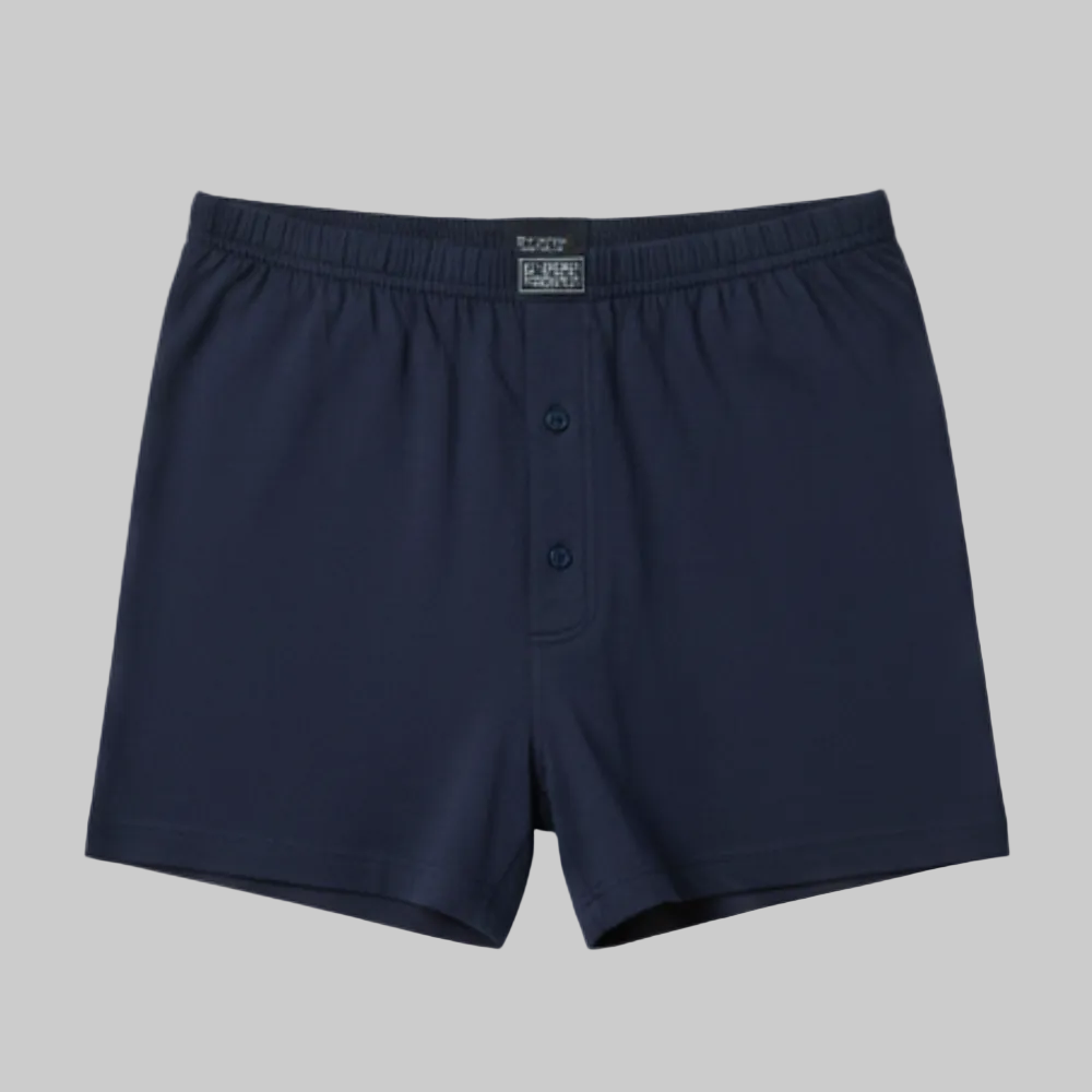 Classic navy blue plain cotton boxer with elastic waistband and button fly, laid flat showing a clean and comfortable everyday design