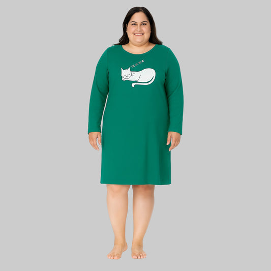 Plus size woman wearing a Cool Emerald Comfort Long Sleeve Sleepshirt in emerald green with long sleeves, knee-length cut, and printed graphic.
