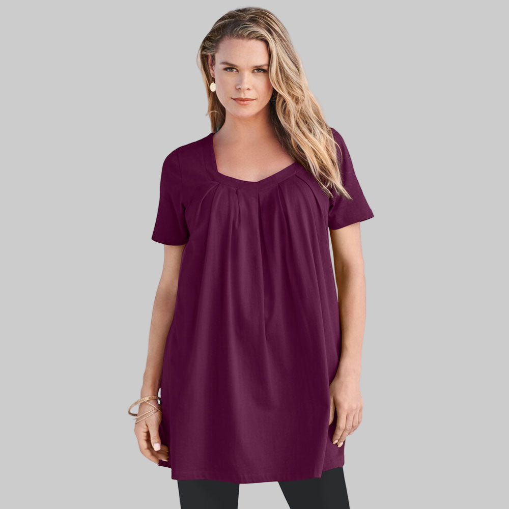 Dark berry pleatneck women’s cotton tunic with sweetheart neckline and swing silhouette on white background.
