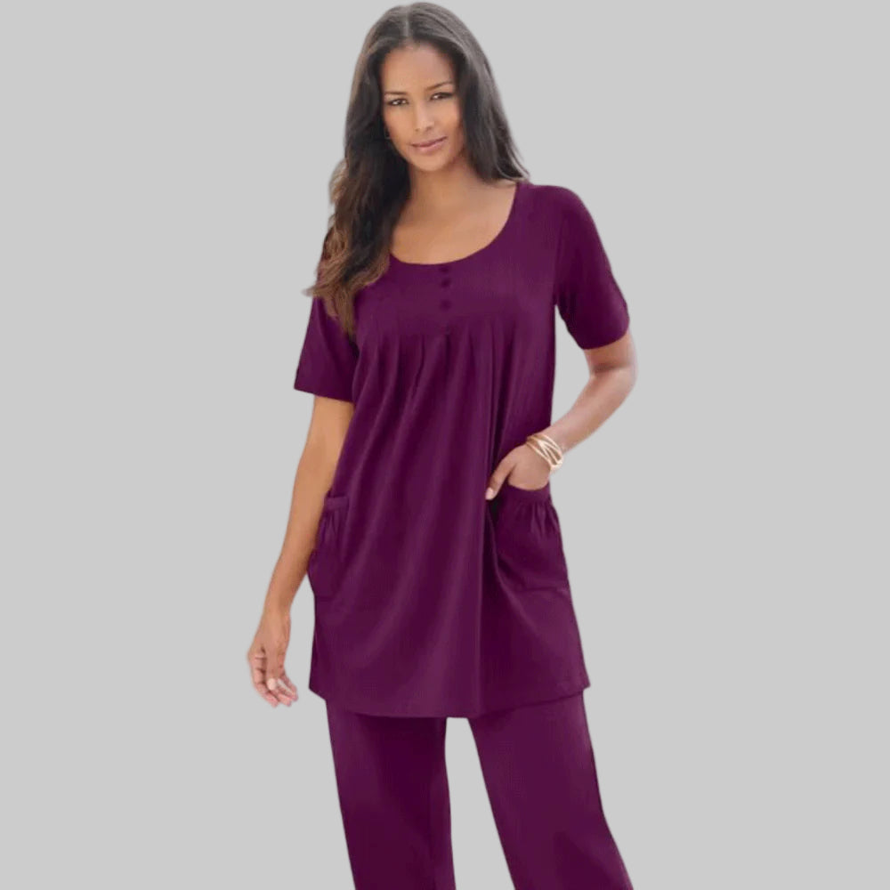 Dark Berry Two Pocket Soft Knit Tunic featuring short sleeves, a scoop neckline, and a relaxed fit for stylish comfort.