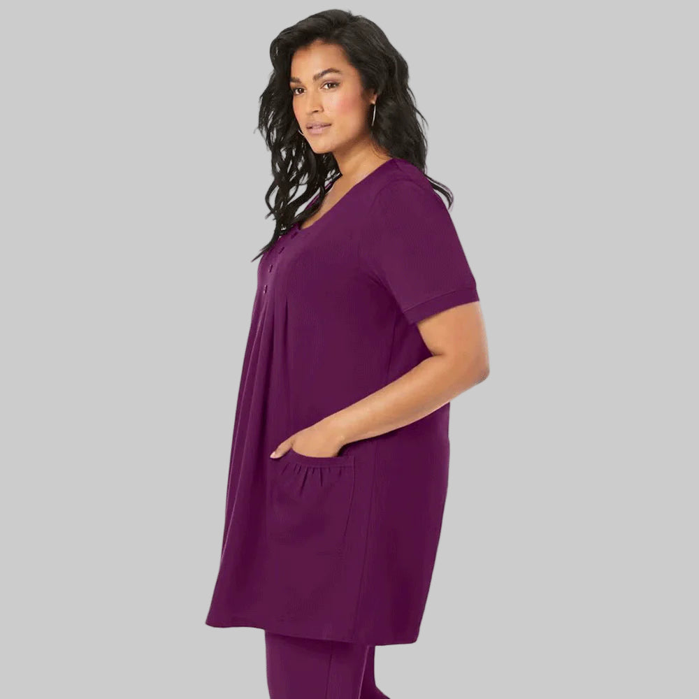 Dark Berry Two Pocket Soft Knit Tunic featuring short sleeves, a scoop neckline, and a relaxed fit for stylish comfort.