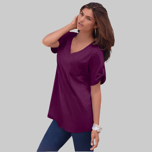 Plus-size textured knit tunic with roll-tab sleeves, a chest pocket, and a high-low hem. Made from breathable pure cotton for effortless everyday style.