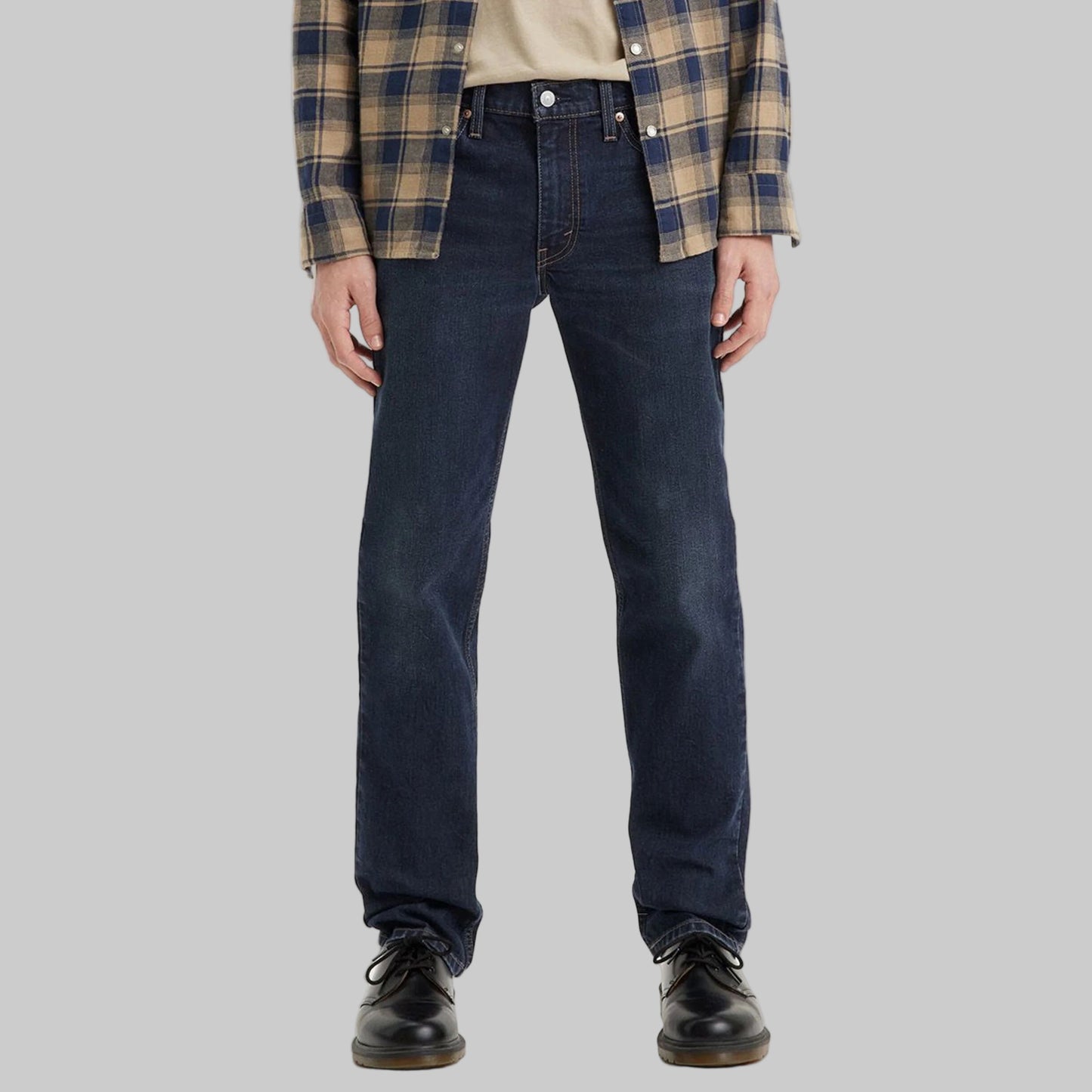 Flat lay of Dark Indigo Signature Slim Straight Jeans in dark indigo wash with high-stretch denim