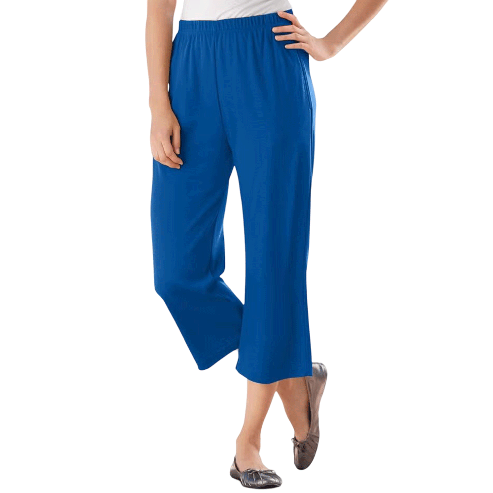 A woman wearing Deep Cobalt 7-Day Knit Capri Pants, featuring a relaxed fit, elastic waistband, and soft knit fabric, ideal for everyday wear.