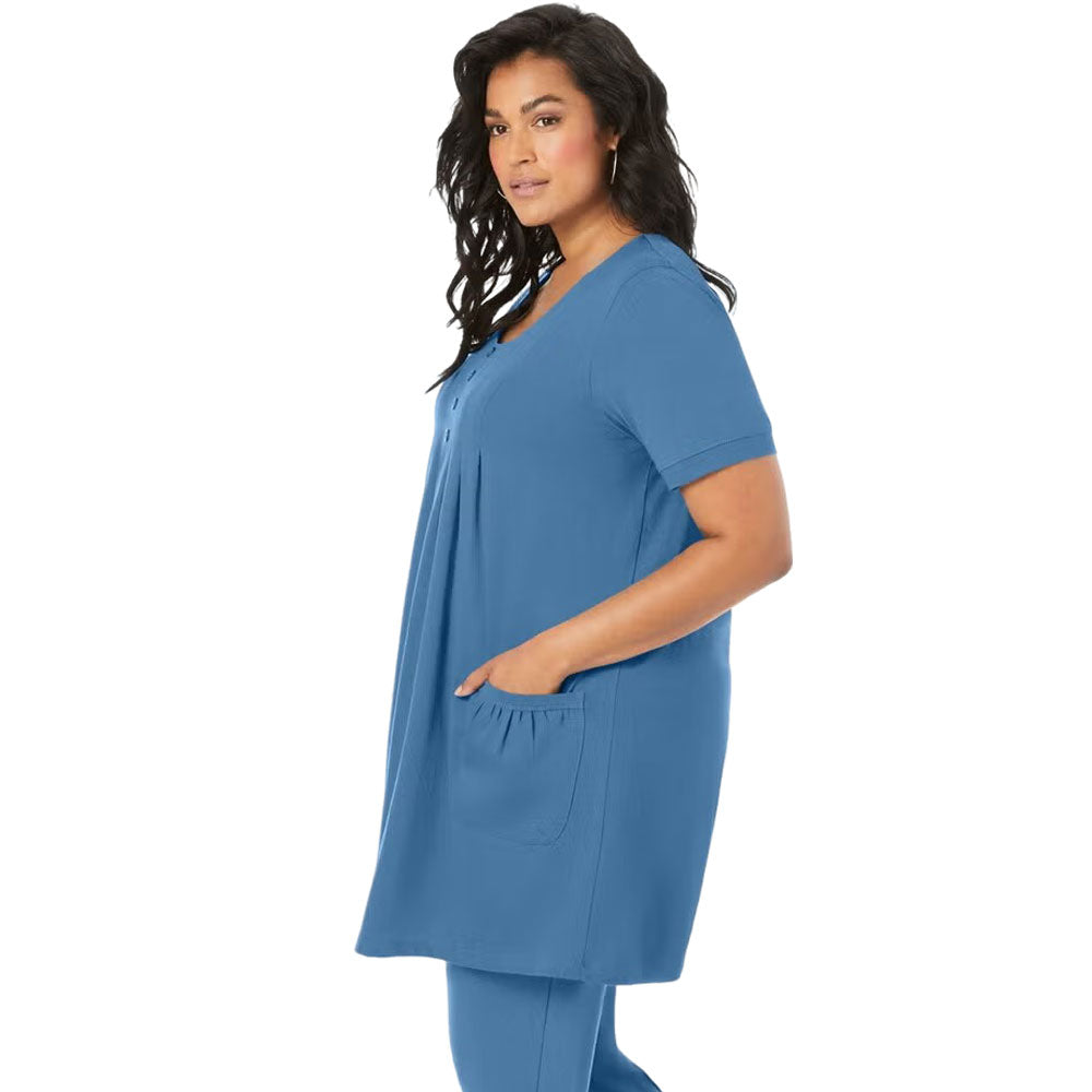 Dusty indigo knit tunic with two front pockets and relaxed tunic silhouette