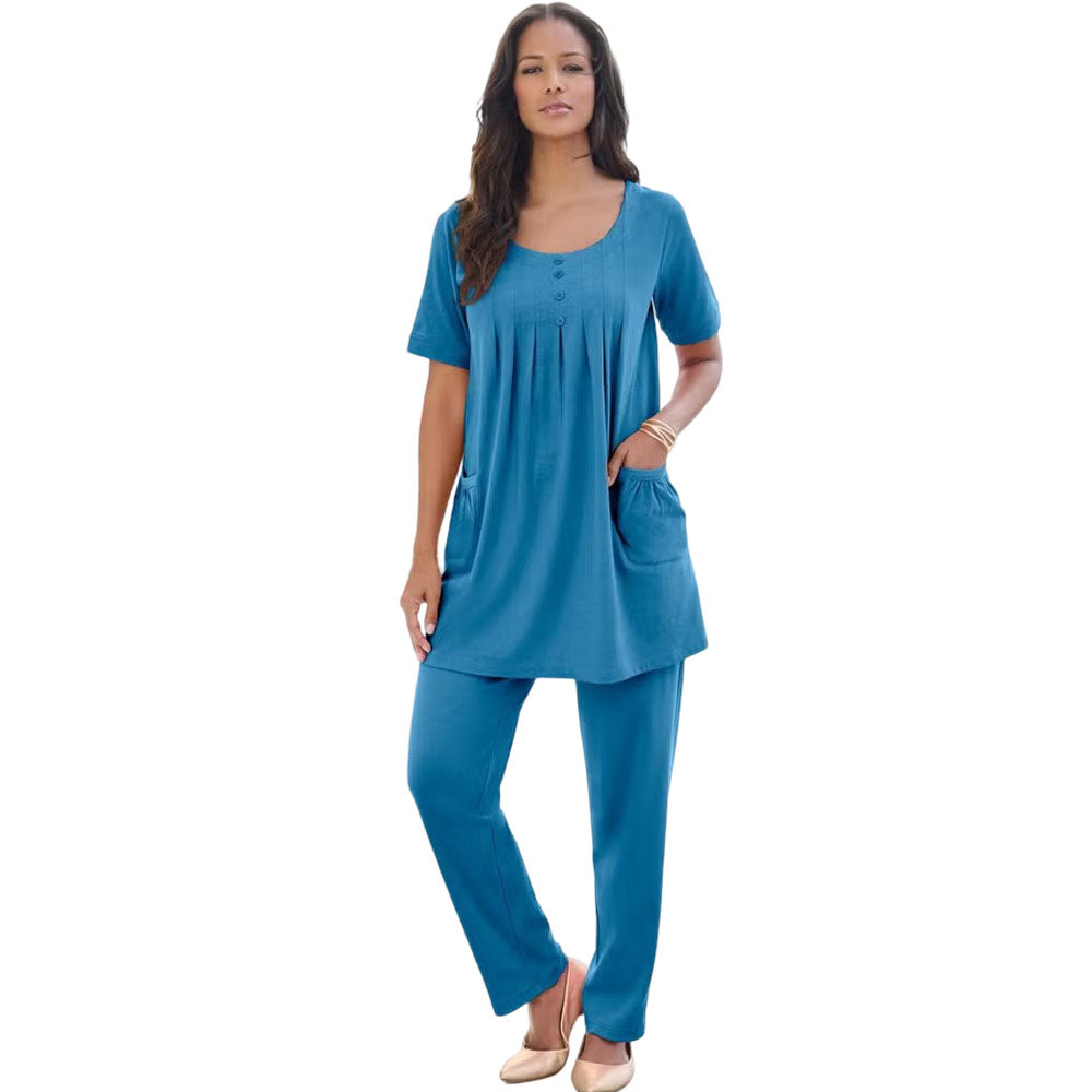 Dusty indigo knit tunic with two front pockets and relaxed tunic silhouette