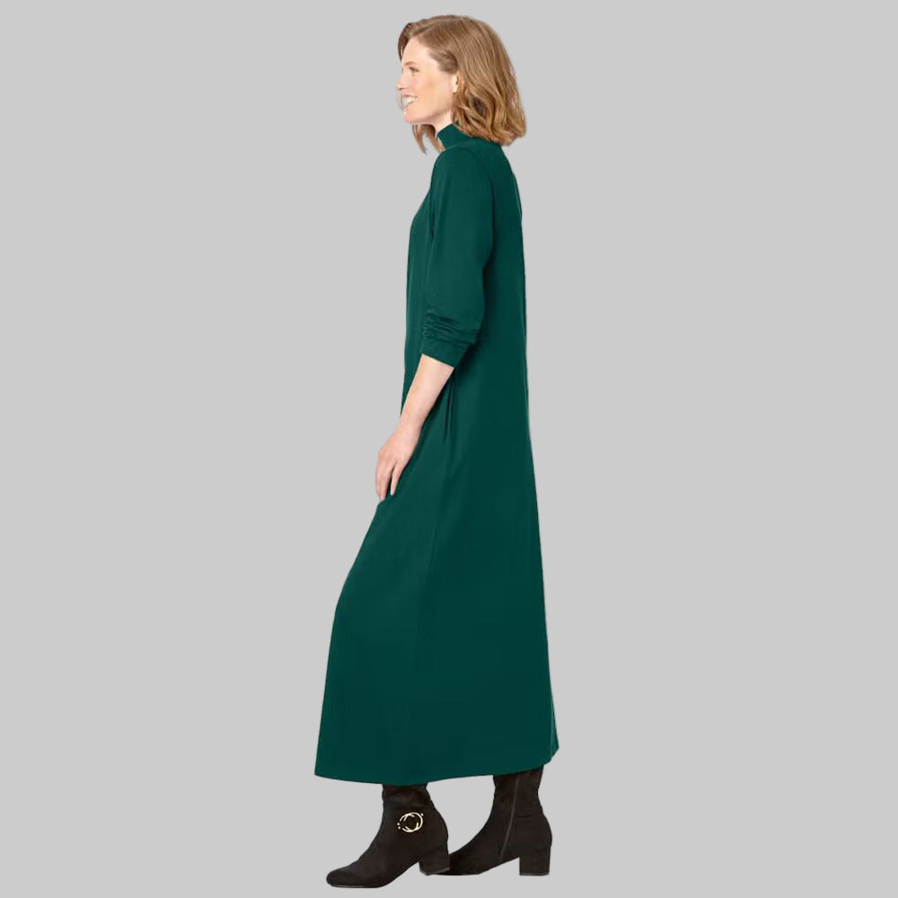 Plus-size woman wearing Emerald Green Mockneck Dress with long sleeves