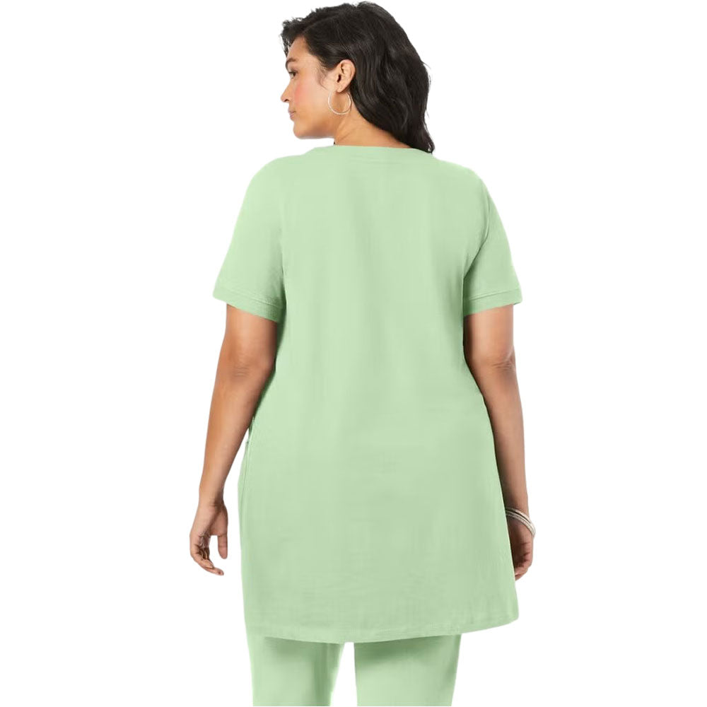 Mint green knit tunic with two front pockets and relaxed fit