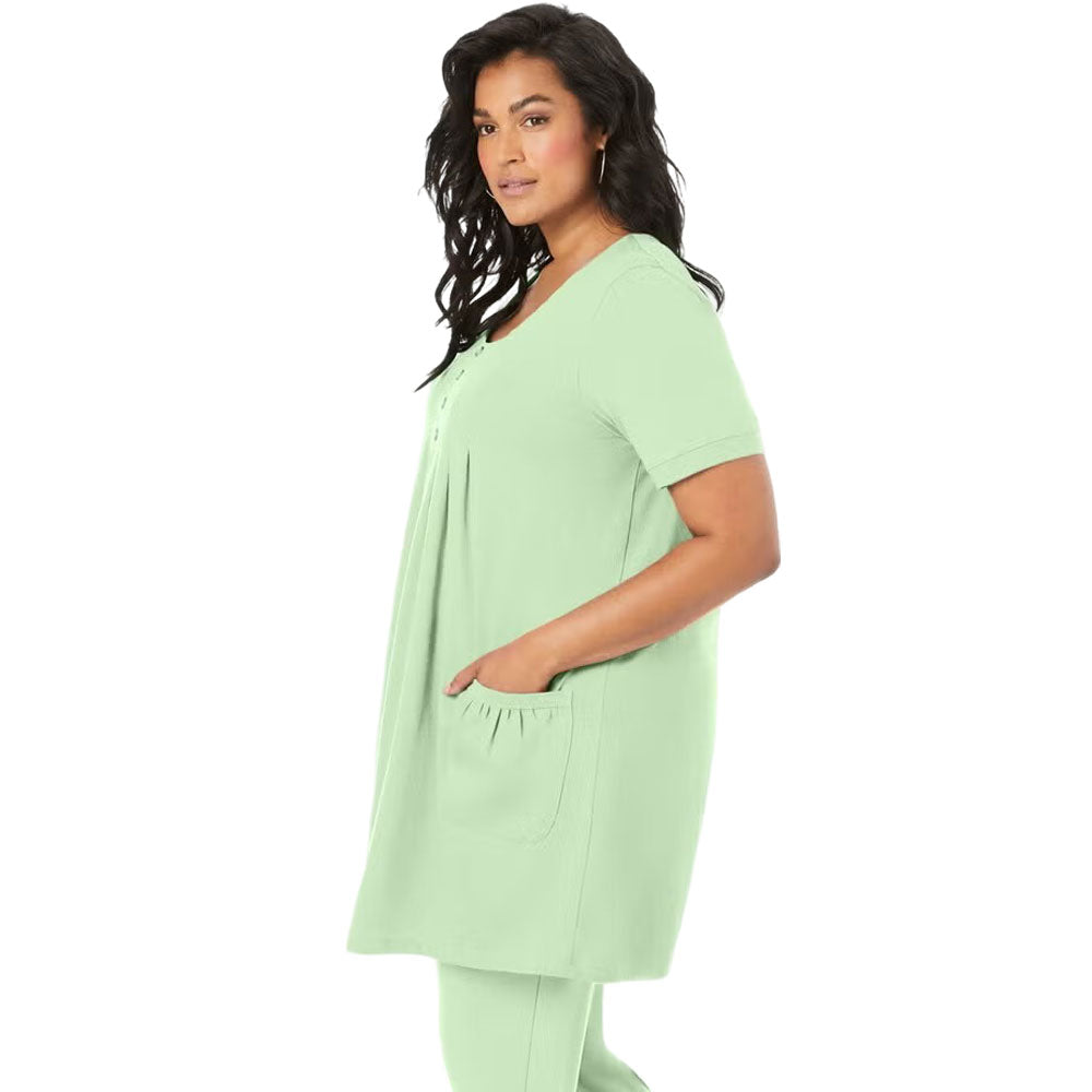 Mint green knit tunic with two front pockets and relaxed fit