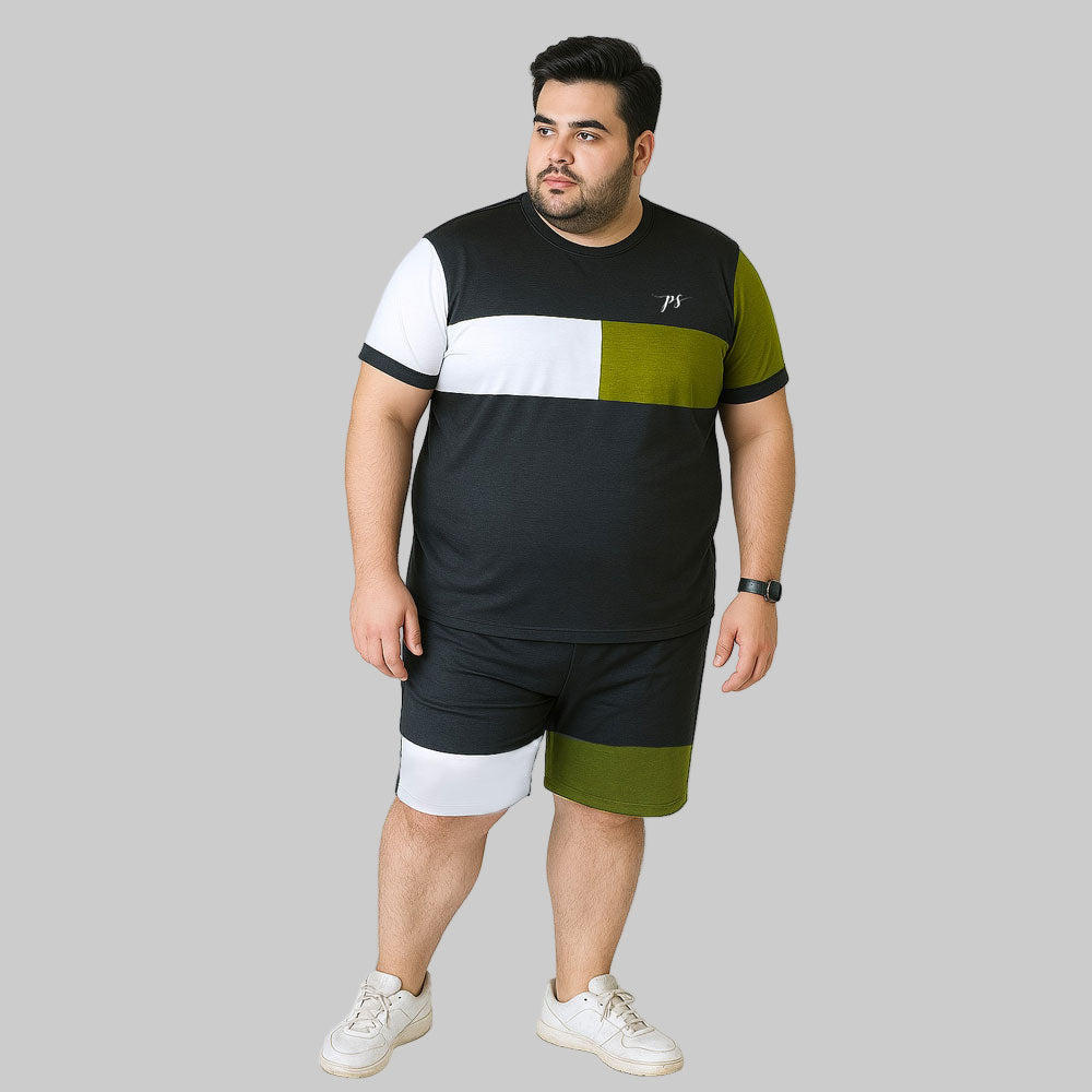 Plus-size male model wearing the Urban Block Plus-Size Shorts Tracksuit in black, green, and white, available in XXL to 6XL at plussize.pk