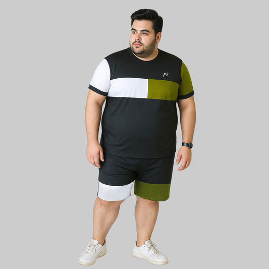 Plus-size male model wearing the Urban Block Plus-Size Shorts Tracksuit in black, green, and white, available in XXL to 6XL at plussize.pk