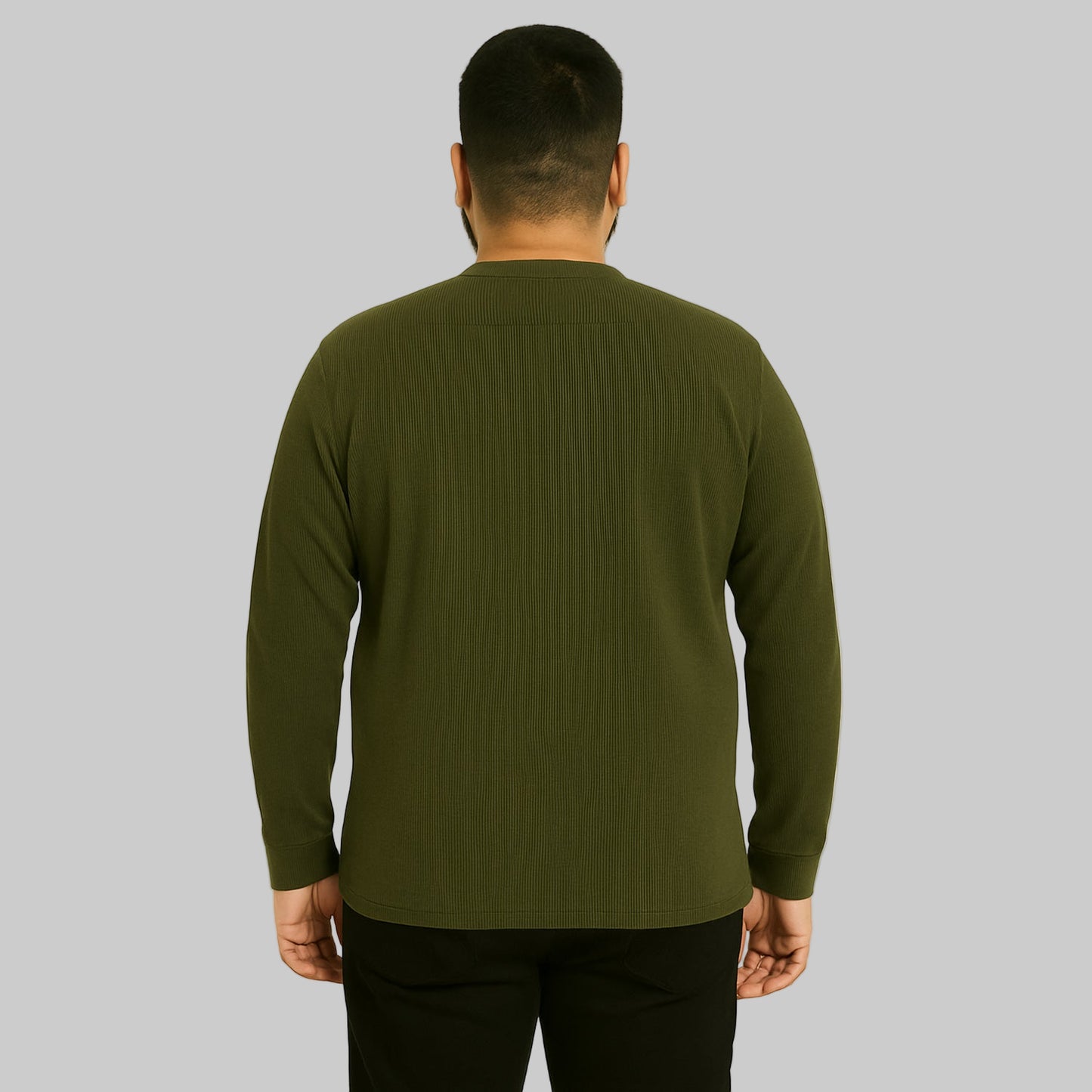 Plus-size Pakistani male model wearing heather olive waffle-knit thermal Henley shirt on a clean studio background, long sleeves, relaxed fit.