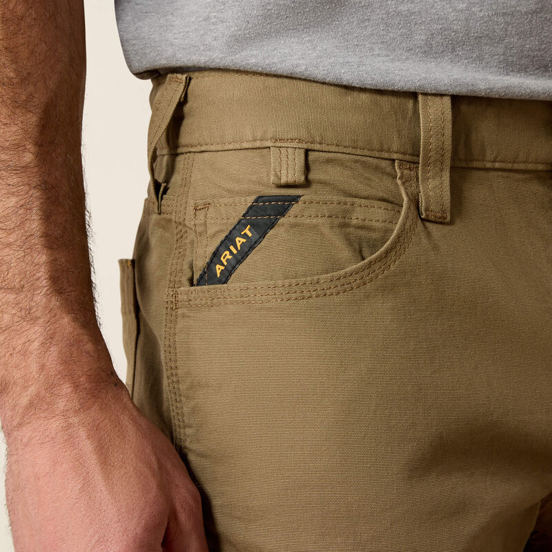 Plus-size male model wearing Khaki DuraStretch Straight Pants, slim seat and thigh, straight leg opening, durable canvas texture, and work-ready utility details.