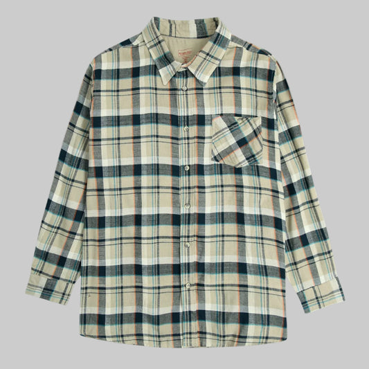 Khaki plaid flannel shirt with horn buttons, chest pocket, and button-down collar — made from soft brushed cotton.