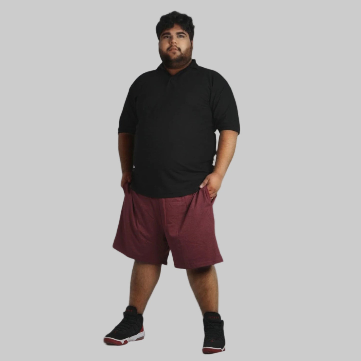 A pair of Maroon Lightweight Jersey Big Size Shorts with a soft jersey fabric, elastic waistband, and adjustable drawstring for a comfortable and stylish fit