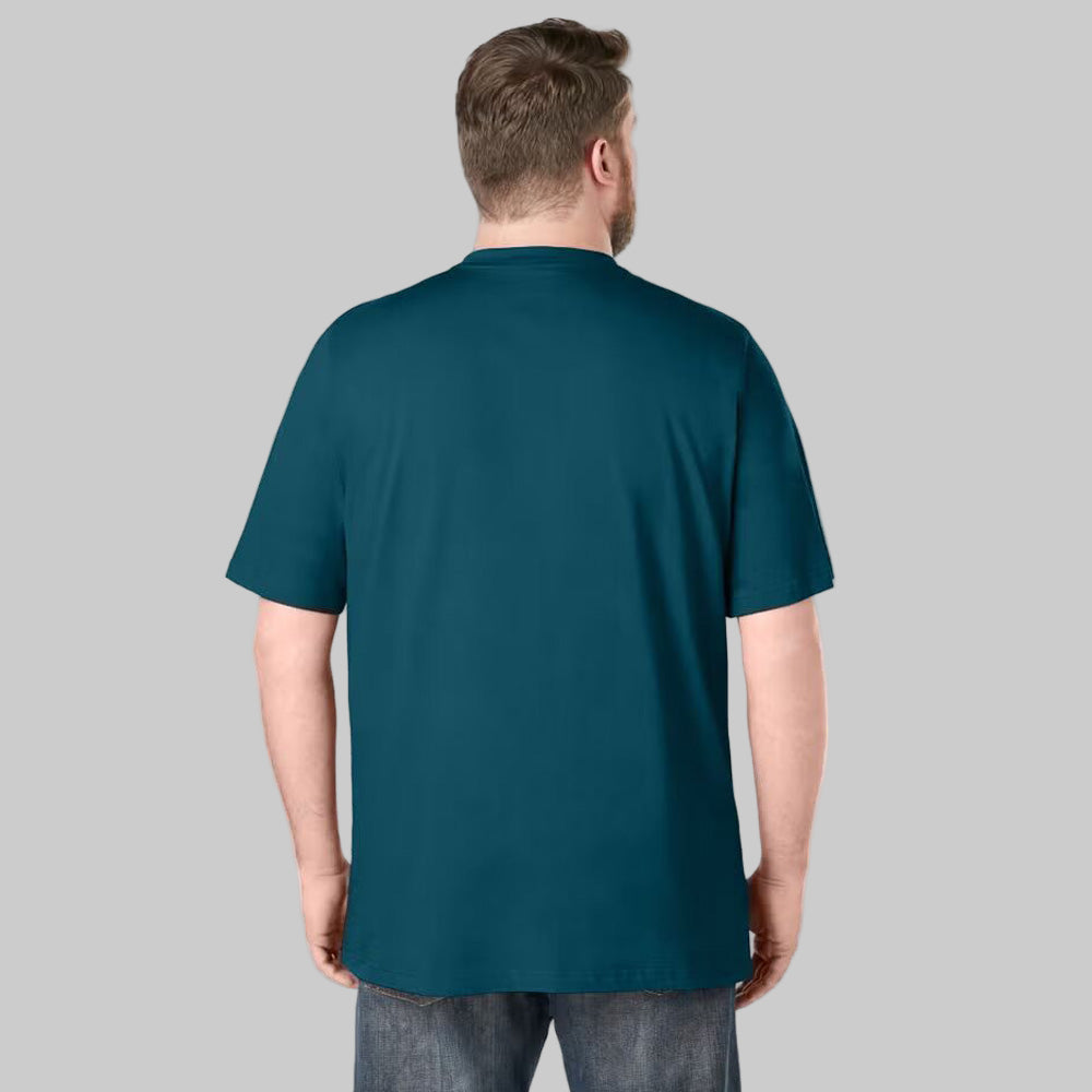 Plus-size Pakistani male model wearing midnight teal short-sleeve Henley shirt with 4-button placket on a studio background, relaxed fit.