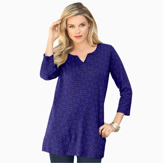 Plus-size soft knit tunic with a stitched notch neckline, three-quarter sleeves, side slits, and a relaxed fit. Made from a breathable cotton/poly blend.