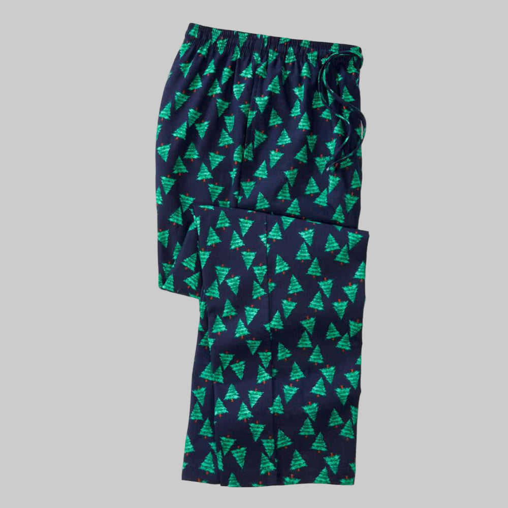 Plus-size man wearing navy evergreen flannel pajama pants with drawstring waist and side pockets.