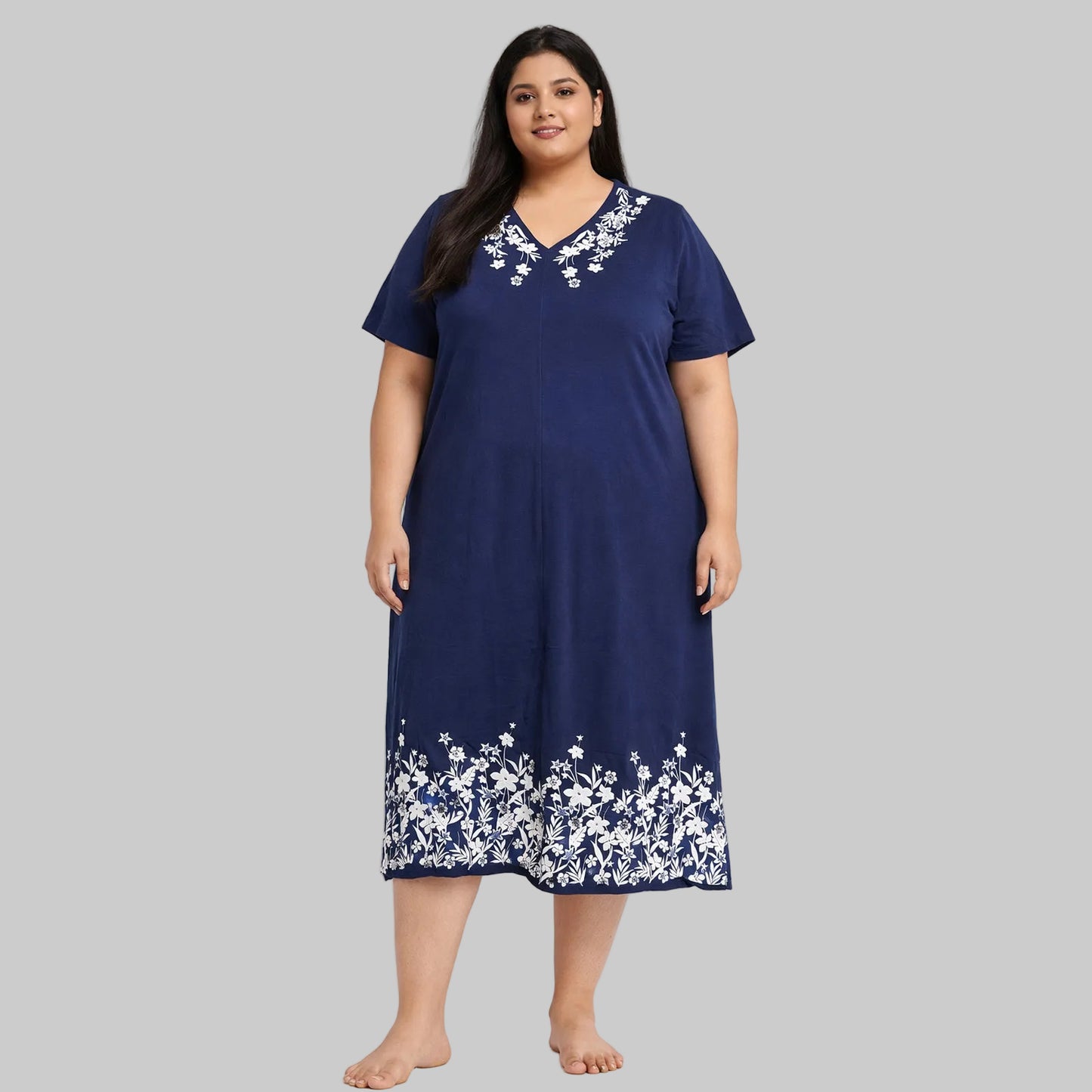 Navy blue women's long shirt with white floral print on neckline and hem front view