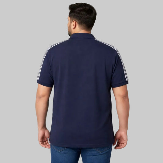 Navy polo shirt with shoulder stripe detail and left chest pocket