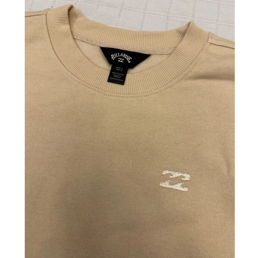 Close-up of fleece texture and ribbed crew neckline in oat tan sweatshirt