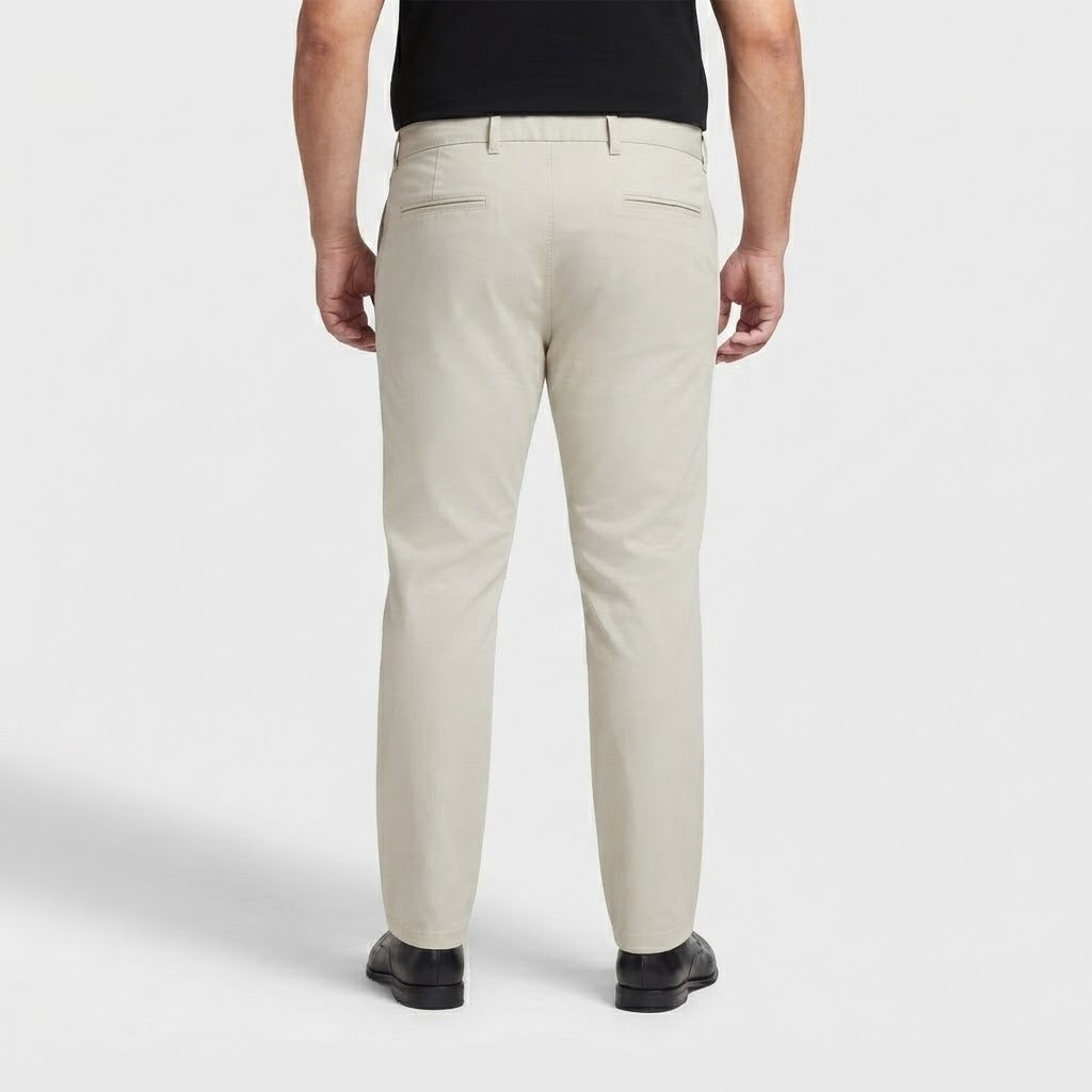 Off White Cotton Chino Pants made from cotton fabric with a classic, versatile design.