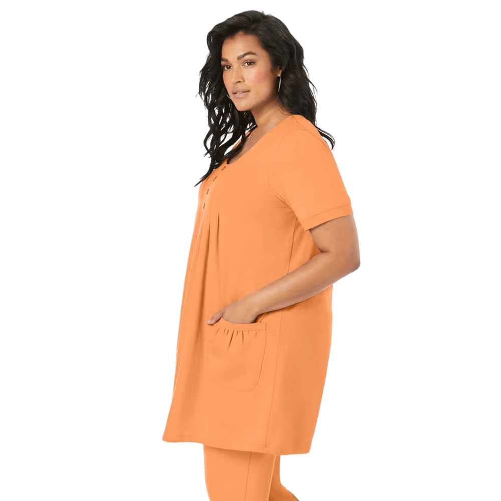 Orange Melon Two Pocket Soft Knit Tunic with short sleeves, scoop neckline, and a relaxed fit for all-day comfort.