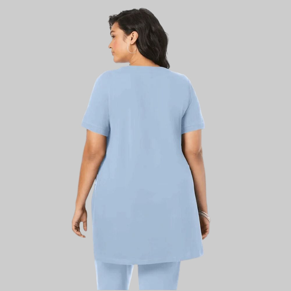 Pale Blue Two Pocket Soft Knit Tunic with short sleeves, scoop neckline, and a relaxed fit for everyday comfort and style.
