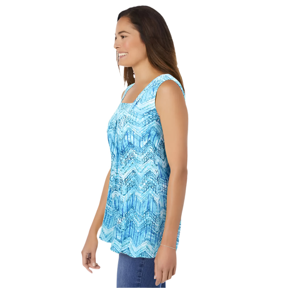 Woman wearing Paradise Blue swing tunic with square neckline, front pleats, and side pockets